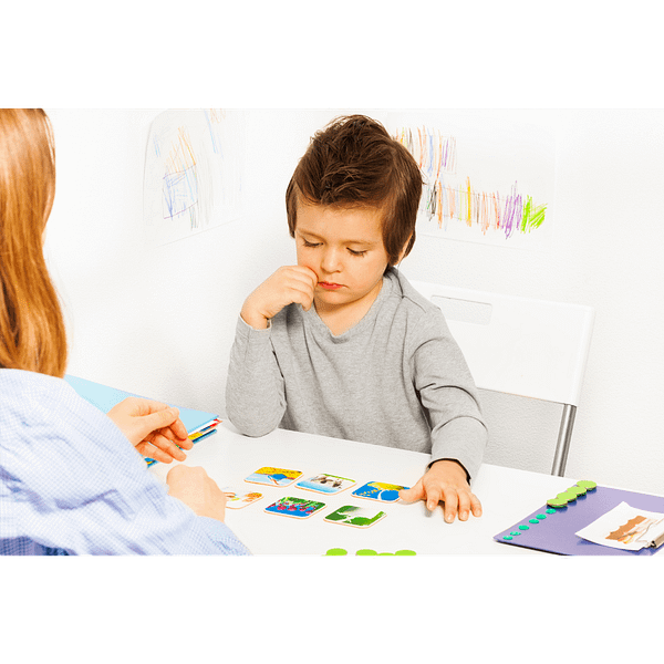 Boy bored playing memory game in homeschool curriculum