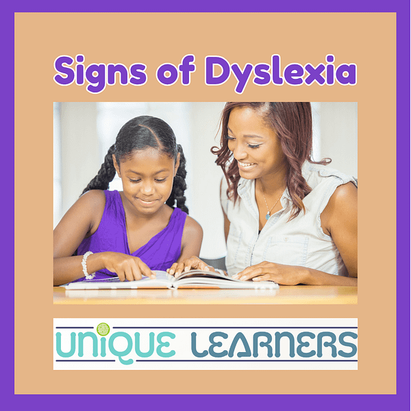 Homeschool parent reviewing signs of dyslexia with a child during a reading lesson.